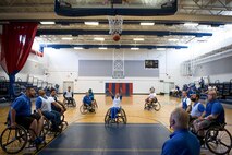 Sandra Marrero, a Wound Warrior CARE athletes shoots a foul shot during the wheelchair basketball session of the adaptive sports camp at Eglin Air Force Base, Fla., April 25. The base hosts the week-long Wound Warrior CARE event that helps recovering wounded, ill and injured military members through specific hand-on rehabilitative training. (U.S. Air Force photo/Samuel King Jr.)