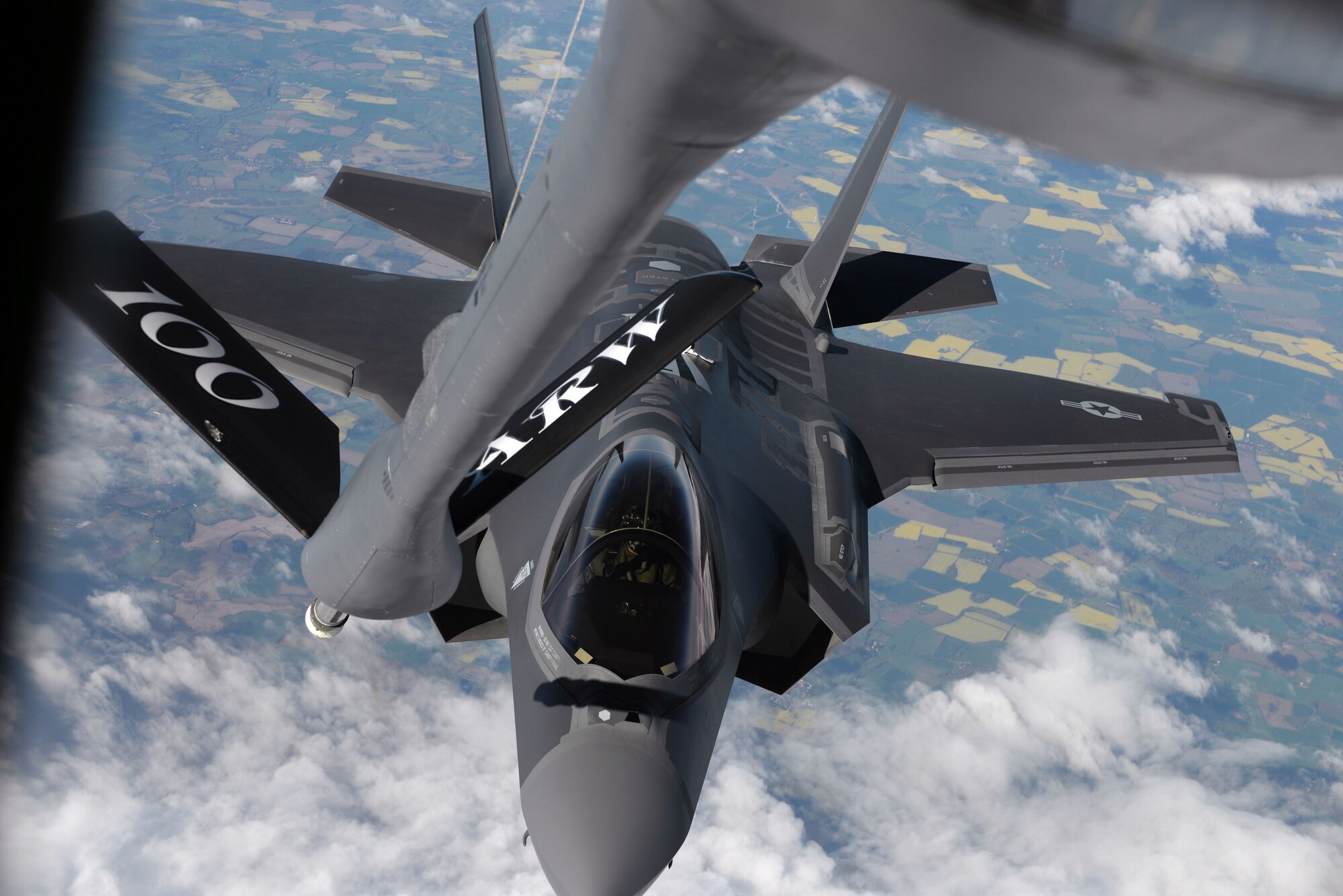 A U.S. Air Force F-35 Lightning II from Hill Air Force Base, Utah, is refueled by a 100th Air Refueling Wing KC-135 Stratotanker during a flight to Estonia on April 25, 2017. The F-35s are participating in their first-ever flying training deployment to Europe. (U.S. Air Force photo by Senior Airman Christine Groening) 
