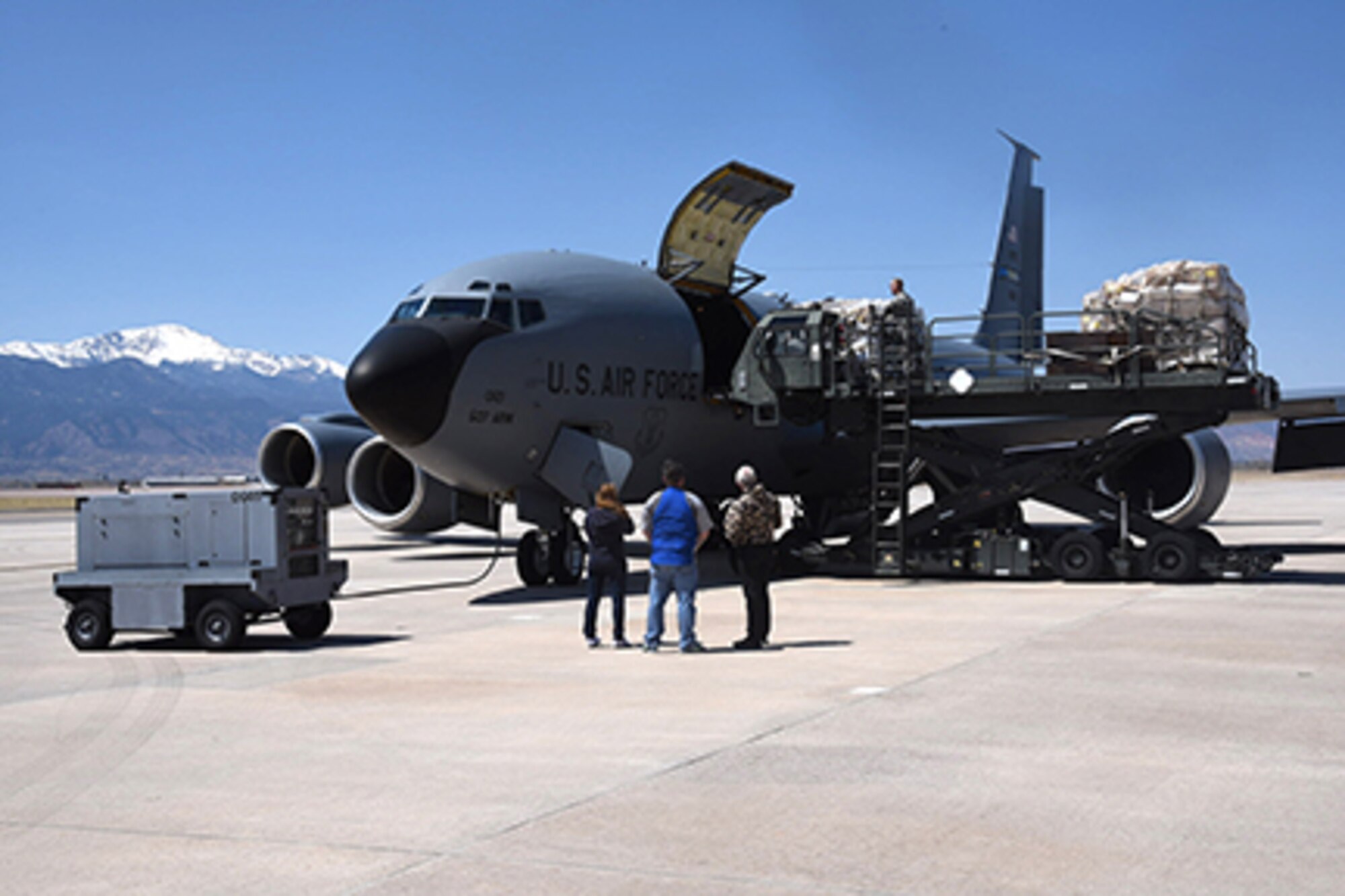 PETERSON AIR FORCE BASE, Colo. - The 21st Space Wing, Logistics Readiness Squadron, along with the 302nd Airlift Wing, 39th Arial Port Squadron, load five pallets containing more than 13,000 pounds of winter jackets and lip balm at Peterson Air Force Base, Colo., April 11, 2017. The supplies will be sent to Charleston Air Force Base, South Carolina, and delivered to Afghanistan at a later date. (U.S. Air Force photo by Robb Lingley) 


