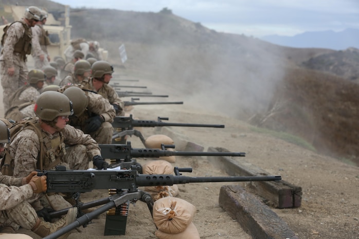 Marines with Company A, Infantry Training Battalion, School of Infantry-West (SOI-West), fire the M2A1 .50 caliber heavy machine gun as part of their basic infantry training at Marine Corps Base Camp Pendleton, Calif. The M2A1 is the Marine Corps’ latest upgrade to the legacy M2 machine gun and enhances Marines’ lethality and survivability on the battlefield. The M2A1 modernizes the M2 with major changes, including set headspace and timing, a quick change barrel, and flash hider that reduces the weapon’s signature by 95 percent. (U.S. Marine Corps photo by Lance Cpl. Joseph A. Prado)