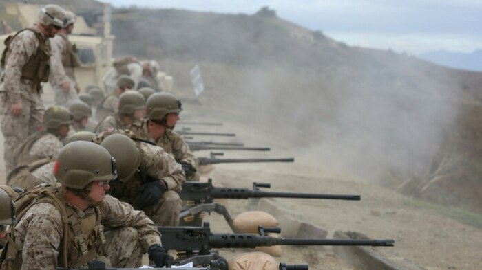 Marines with Company A, Infantry Training Battalion, School of Infantry-West (SOI-West), fire the M2A1 .50 caliber heavy machine gun as part of their basic infantry training at Marine Corps Base Camp Pendleton, Calif. The M2A1 is the Marine Corps’ latest upgrade to the legacy M2 machine gun and enhances Marines’ lethality and survivability on the battlefield. The M2A1 modernizes the M2 with major changes, including set headspace and timing, a quick change barrel, and flash hider that reduces the weapon’s signature by 95 percent. (U.S. Marine Corps photo by Lance Cpl. Joseph A. Prado)