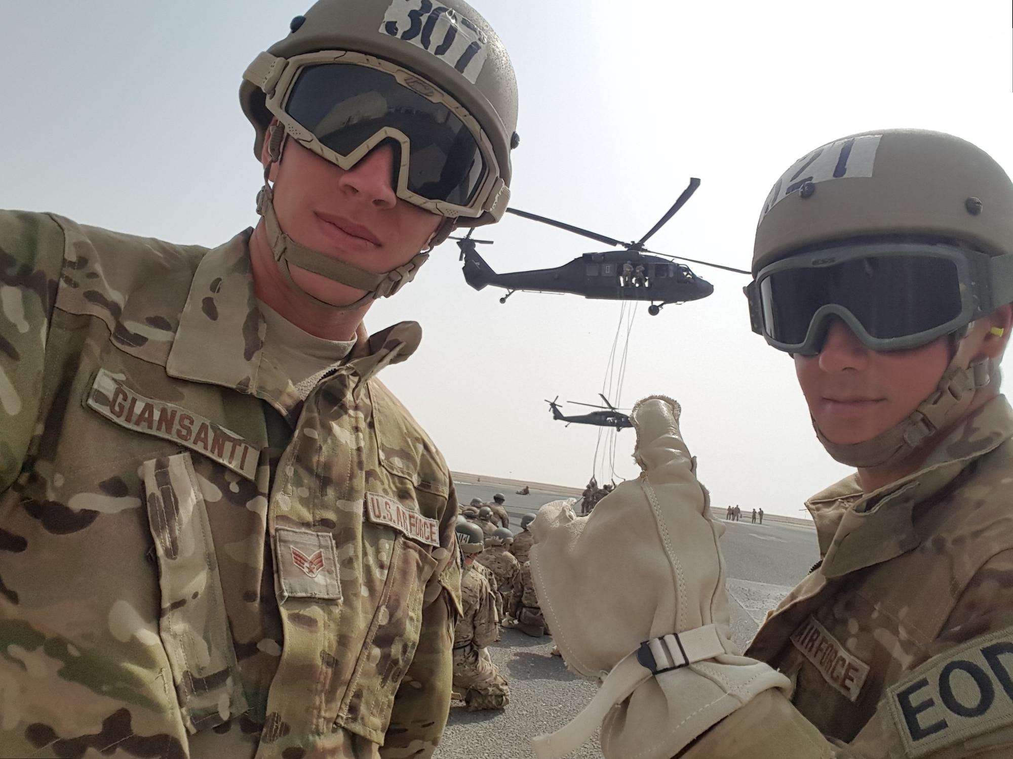 Senior Airman Daniel Giansanti, left, and Senior Airman Domenic Martino, both 386th Air Expeditionary Wing civil engineering squadron explosive ordnance disposal unit technicians, pose for a photo at U.S. Army Air Assault School at Camp Buehring, Kuwait on April 13, 2017. The graduation of the two Airmen from the 386th also serves as an unprecedented event, as this is the first time in history that Airmen have graduated from this particular course. (Courtesy photo)