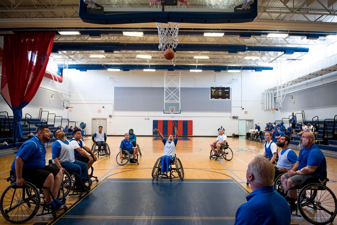 An athlete takes a shot during the wheelchair basketball session of the adaptive sports camp at Eglin Air Force Base, Fla., April 25, 2017. Air Force photo by Samuel King Jr.