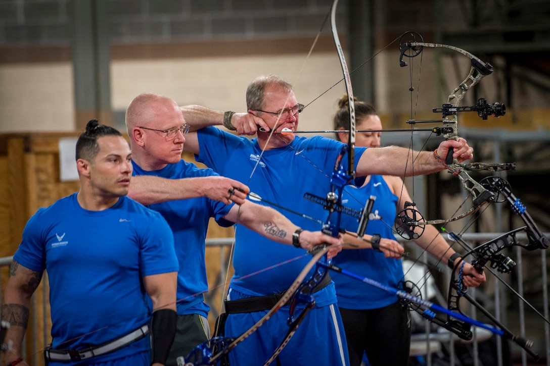 Athletes take aim during an archery session at the Air Force team’s training camp at Eglin Air Force Base, Fla., April 25, 2017. Air Force photo by Samuel King Jr.