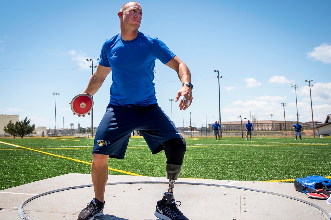 Airmen Ben Seekell begins a discus rotation during a track and field session at the Air Force team’s training camp at Eglin Air Force Base, Fla., April 25, 2017. Air Force photo by Samuel King Jr.