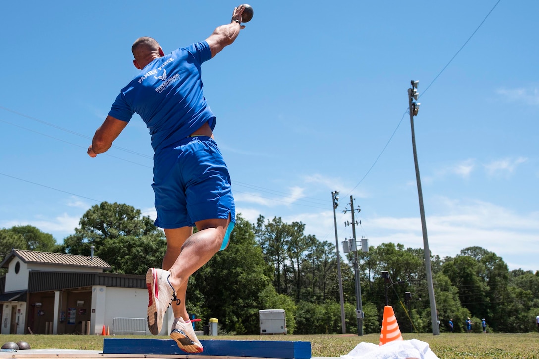 Matt Cable releases his shot during a track and field session at the Air Force team’s training camp at Eglin Air Force Base, Fla., April 25, 2017. Air Force photo by Samuel King Jr.