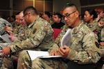 Chief Warrant Officer Edwin Parubrub of the Hawaii Army National Guard Defensive Cyberspace Operations-Elements reads through notes while waiting for the introductory briefing for exercise Cyber Shield to begin, at Camp Williams, Utah, April 24, 2017. Cyber Shield 17 is an Army National Guard defensive cyberspace operations exercise with approximately 800 members of the Army National Guard, Air National Guard, Army Reserve and representatives of state and federal government agencies, industry partners and academia taking part. The purpose of the exercise is to provide a collective training event to evaluate cyber operations and set the conditions for team validation. 