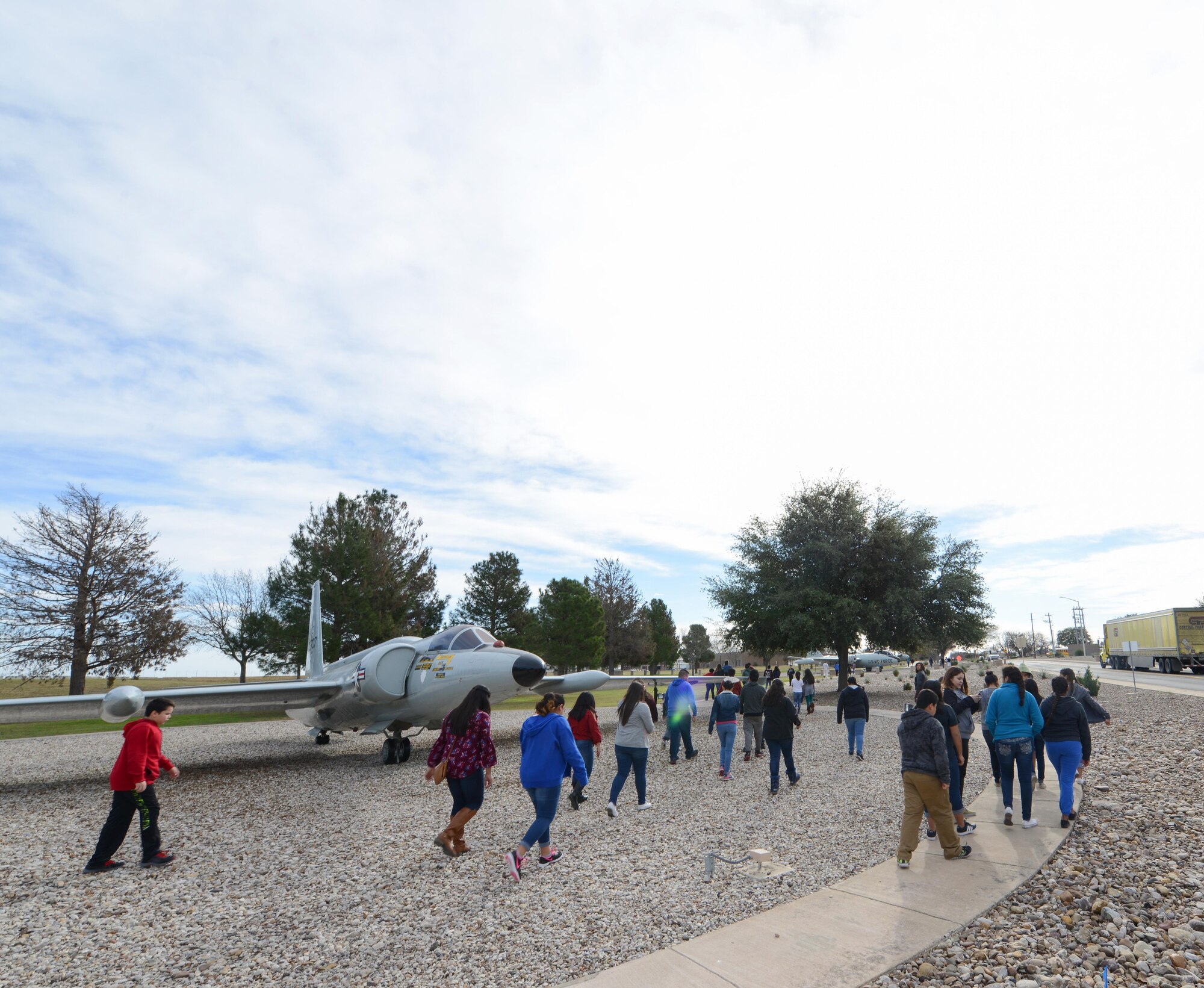 A Del Rio Middle School class walks in front of a U-2 Dragonlady static display on Laughlin Air Force Base, Texas, Jan. 25, 2017. Laughlin now offers tours to the middle school to show the students more about the base. (U.S. Air Force photo/Airman 1st Class Benjamin N. Valmoja)