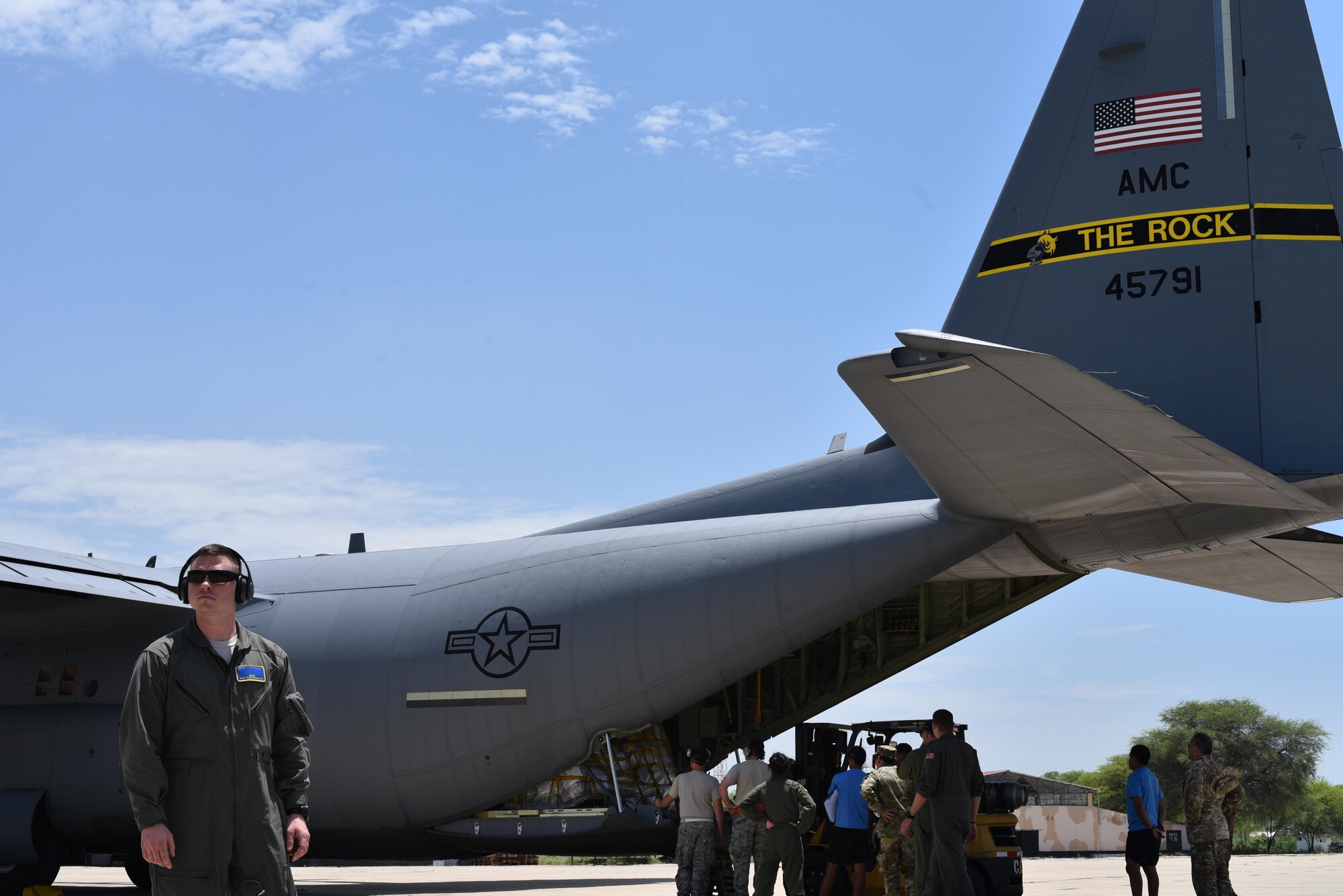 U.S. Air Force Staff Sgt. Zachariah Main, 19th Security Forces Fly Away Security Team (FAST) member, secures a C-130J assigned to Little Rock Air Force Base, Ark., April 16, 2017, in Lima, Peru. (U.S. Air Force photo by Staff Sgt. Jael Laborn)