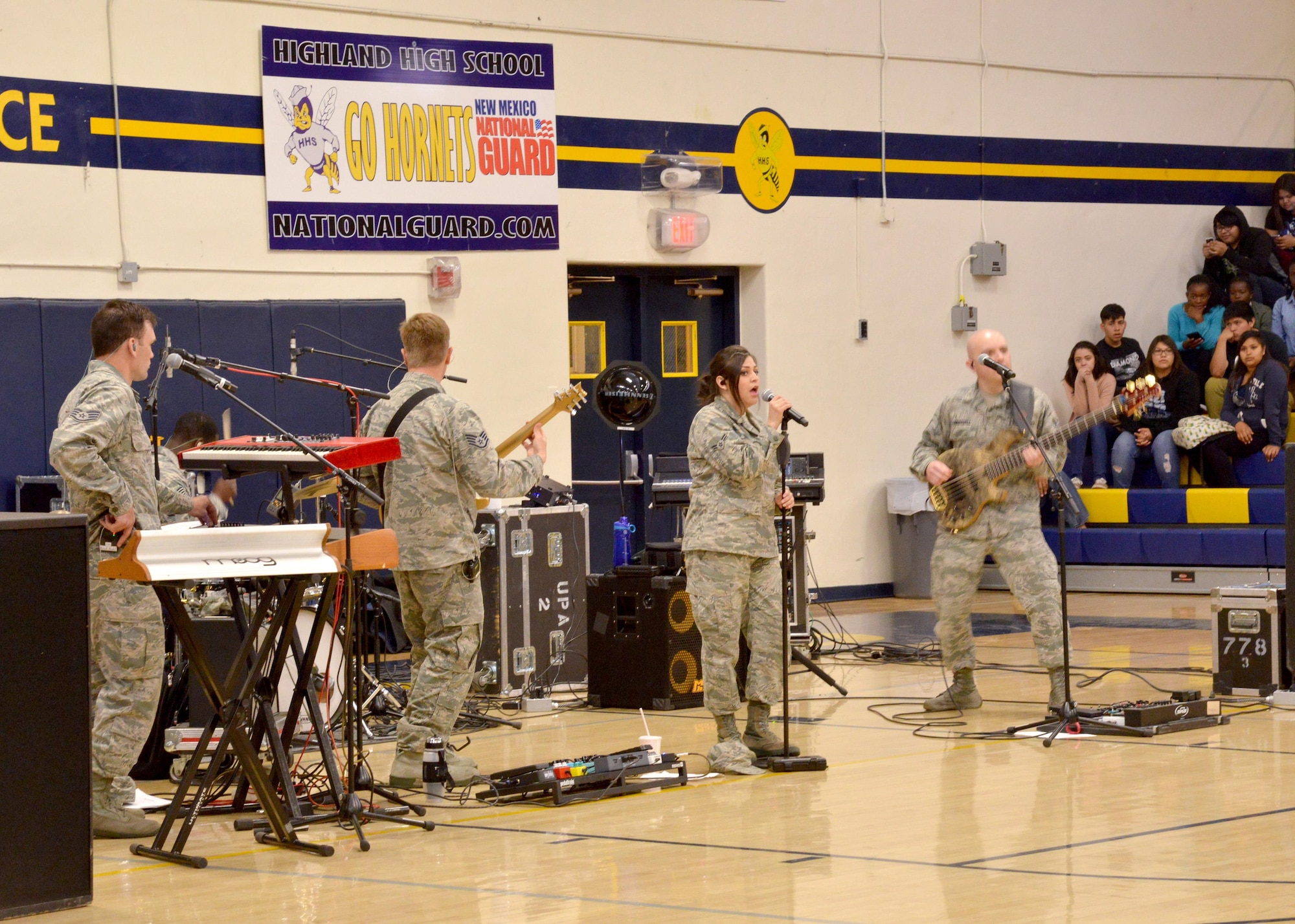 The U.S. Air Force Academy band Blue Steel performs a concert for students at Highland High School in Albuquerque. Blue Steel performs high energy music from a variety of genres, and its versatility and dynamic stage presence enables the band to help tell the Air Force story to audience members of all ages. 