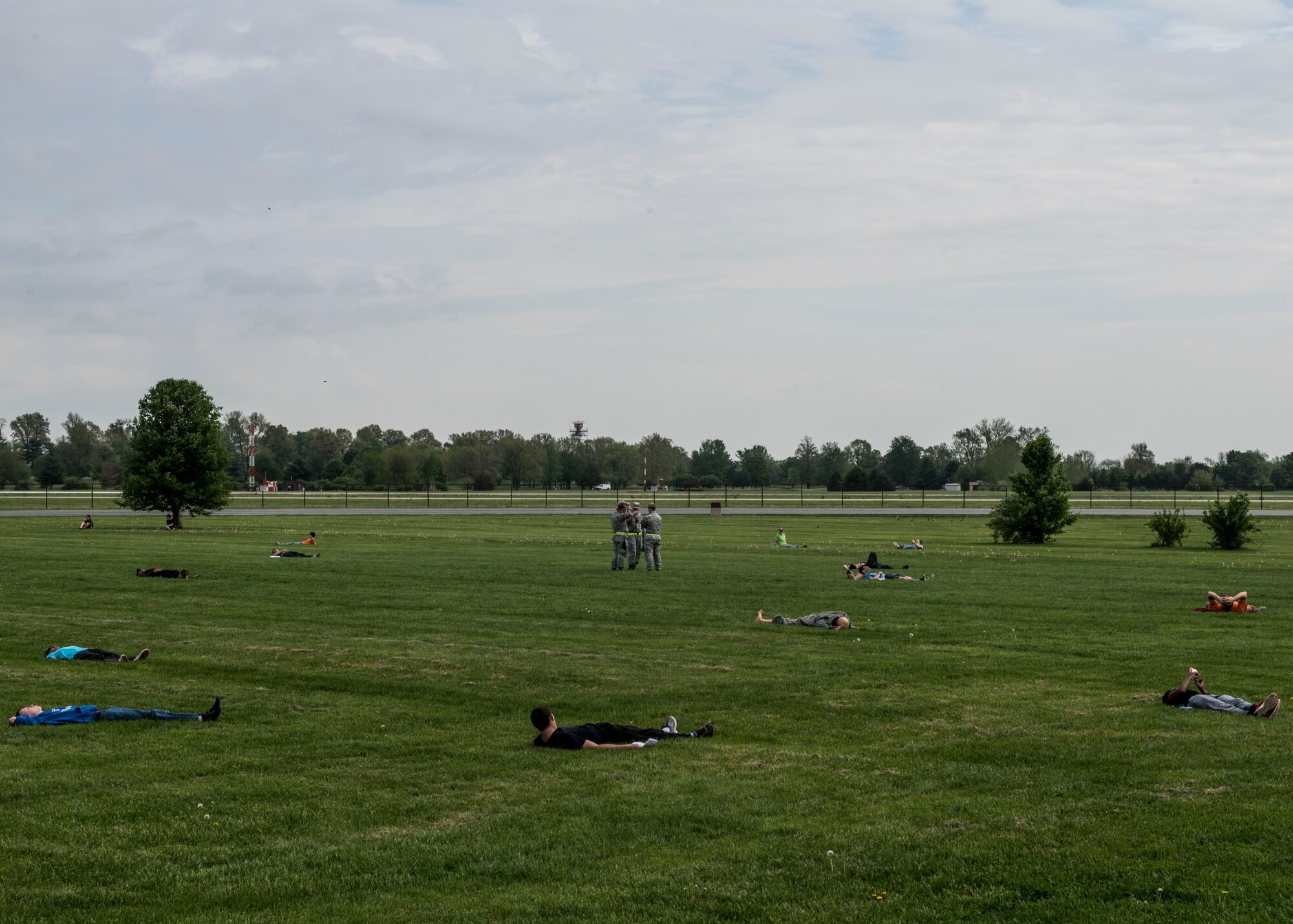 Bodies lie scattered across Warrior Park, where a simulated aircraft crash tested the response of Scott Air Force Base personnel in the event of an emergency during this year’s Air Show, Scott Air Force Base, Ill., April 20, 2017.  The exercise prepared Scott Air Force Base personnel for air show incident response.  First responders managed over 70 patients and practiced their procedures in the event of an aircraft accident.   (U.S. Air Force photo by Staff Sgt. Jodi Martinez)
