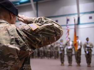 U.S. Army Col. John Smith, 128th Aviation Brigade commander, salutes during the brigade’s Change of Responsibility ceremony at Joint Base Langley-Eustis, Va., April 25, 2017. During the ceremony, Smith spoke about his experiences with U.S. Army Command Sgt. Maj. Stanton Brown Jr., outgoing brigade command sergeant major, had during his time at JBLE and thanked Brown for his continuous support. (U.S. Air Force photo/Airman 1st Class Kaylee Dubois)