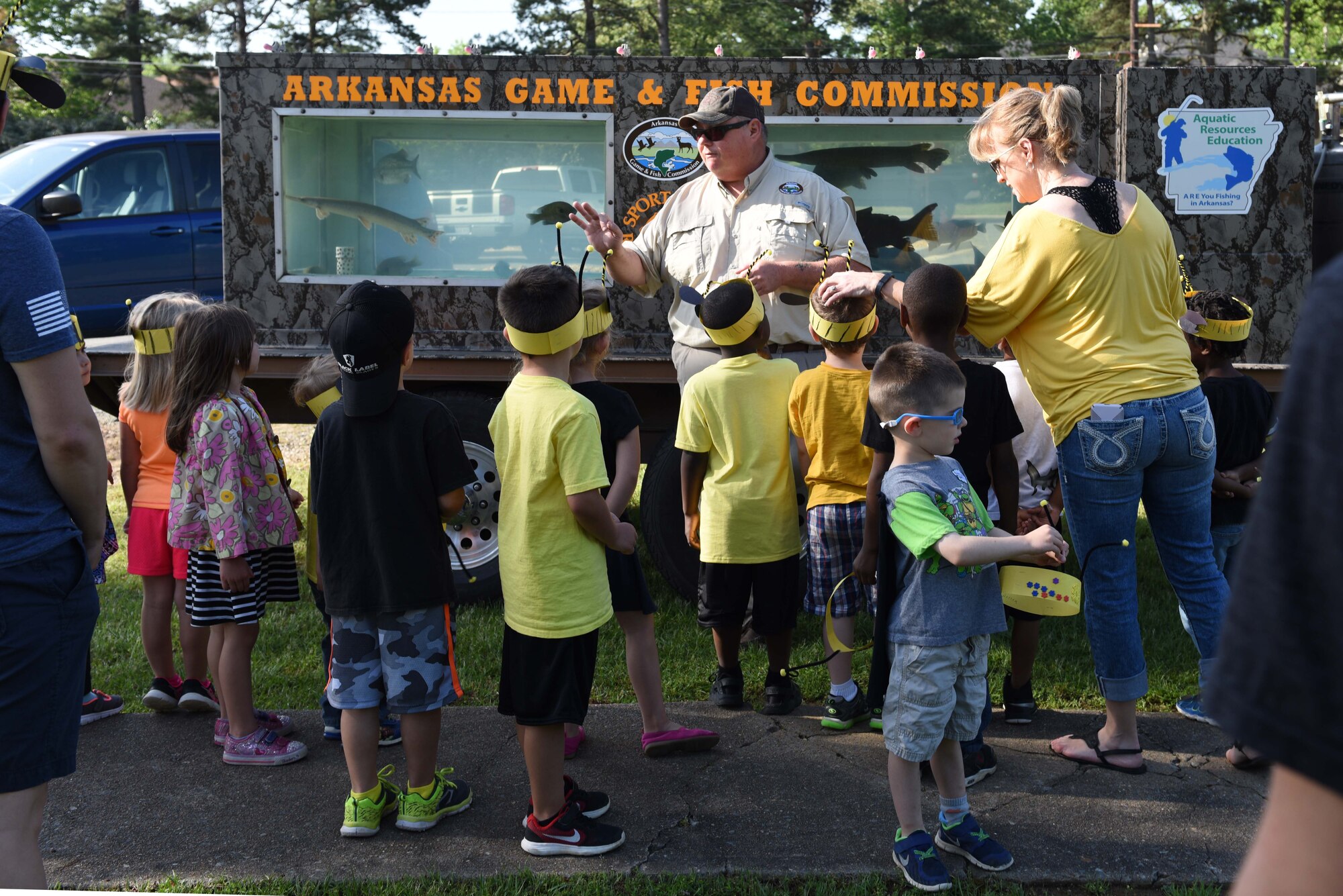 James Davidson, Arkansas Game and Fish Commission natural resources program technician, teaches Arnold Drive Elementary school students about local fish species at the Earth Day Expo April 20, 2017, on Little Rock Air Force Base, Ark. Other environmental agencies such as the U.S. Forestry Service, U.S. Fish and Wildlife Service and the Pulaski Conservation district came out to teach students about the importance of conservation. (U.S. Air Force photo by Senior Airman Mercedes Taylor) 