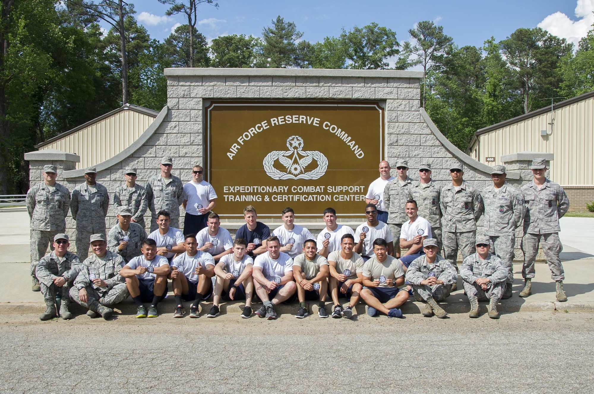 Air Force Reserve firefighters graduate from the first-ever Air Force Reserve Command Firefighter Rescue and Survival Course at Dobbins Air Reserve Base, Ga., April 18, 2017. Twenty Citizen Airmen participated in the intense 50-hour course held at the 622nd Civil Engineer Group expeditionary combat support-training certification center, which focused on a Rapid Intervention Crew, or RIC. The RIC is a dedicated and specially trained group of firefighters whose responsibilities include safely evacuating a distressed firefighter from a structure. (U.S. Air Force photo by Master Sgt. Theanne K. Herrmann)