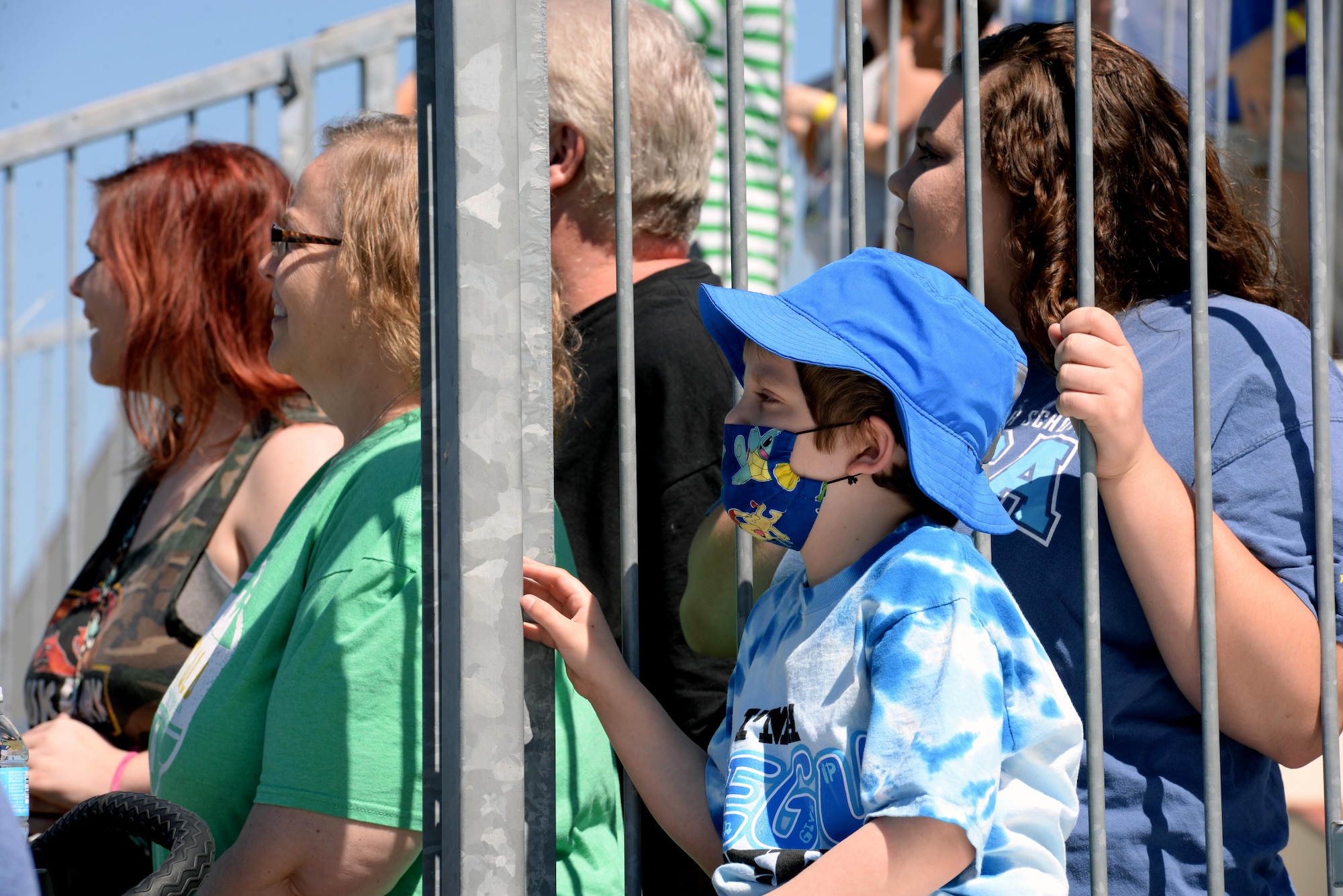 T.J. Esco watches acrobatic airplanes fly during the Maxwell Air Show, April 9, 2017. This is T.J.’s first Air Show, where he could see all his favorite airplanes fly. (U.S. Air Force photo/Senior Airman Tammie Ramsouer)