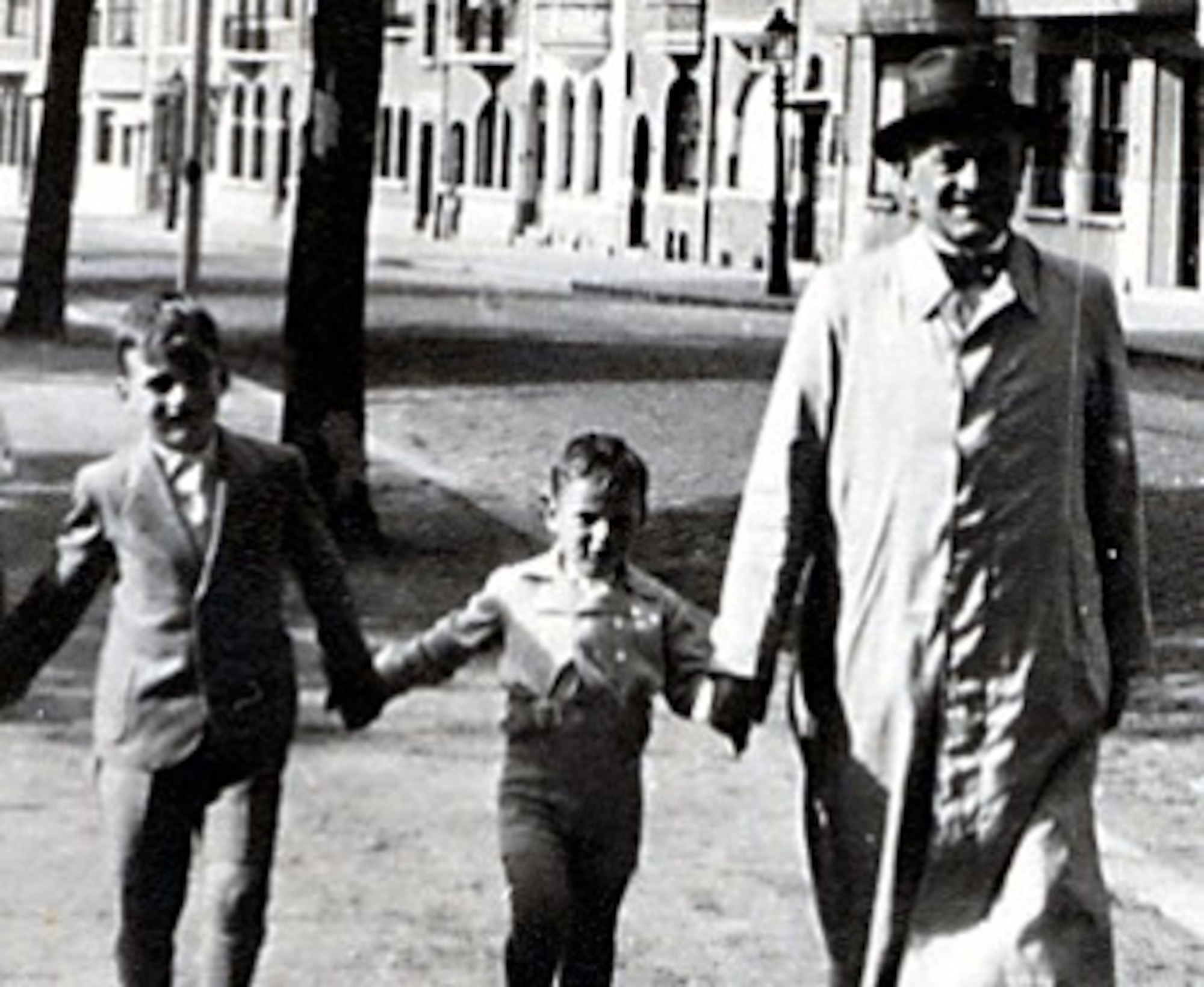 Fred Manasse, a Holocaust survivor, is flanked by his brother, Gus, and his father, Alfred, in Brussels December 1, 1939. Fred and his brother survived, but his father was killed in the Auschwitz concentration camp. Manasse relayed his experiences as part of the Holocaust Days of Remembrance at Hanscom Air Force Base, Massachusetts, April 24, 2017. (Photo courtesy of Fred Manasse)