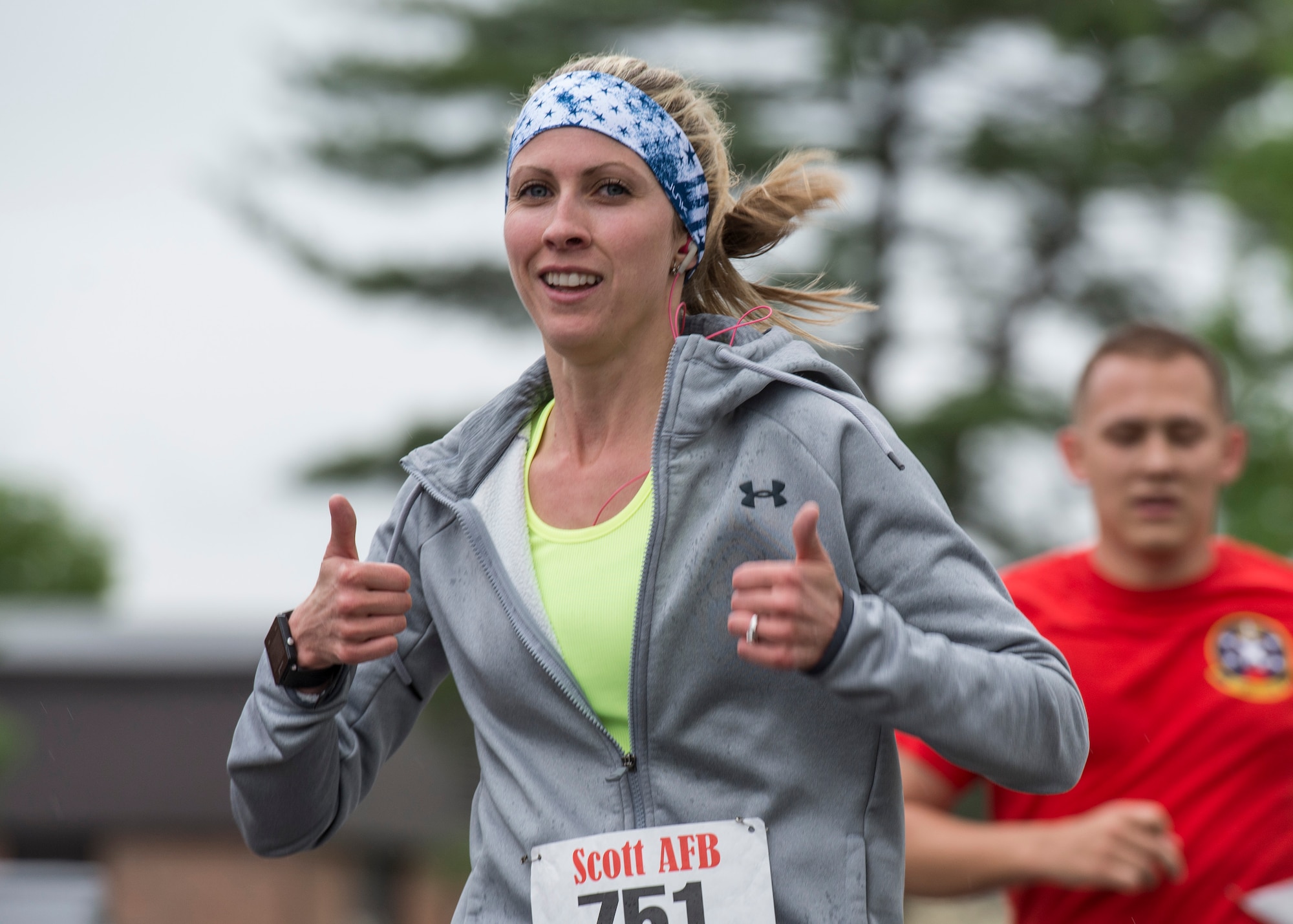 A participant Of the Race Through Scott’s Past gives a thumbs up before finishing the race at Scott Air Force Base, Illinois, April 21, 2017. The event provided an opportunity for Team Scott and the local community to celebrate and learn about the instillation’s history. (U.S. Air Force photo by Airman Chad Gorecki)