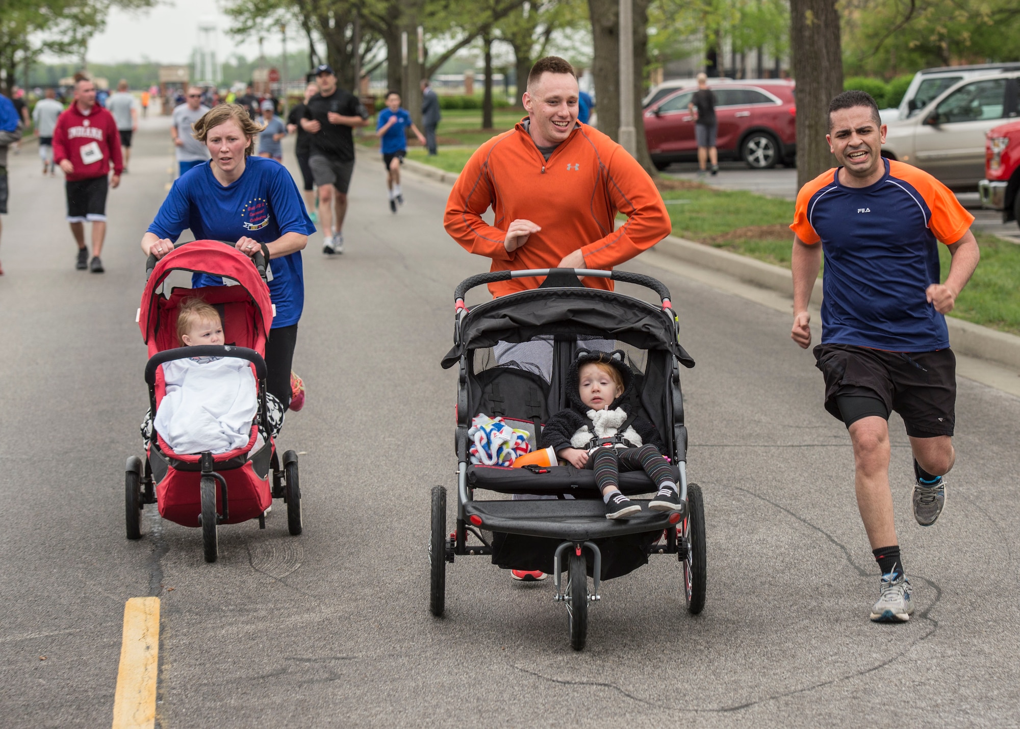 Participants sprint to finish the Race Through Scott’s Past at Scott Air Force Base, Illinois, April 21, 2017. The race saw a variety of participants including active duty members, civilian members, children and pets. (U.S. Air Force photo by Airman Chad Gorecki)