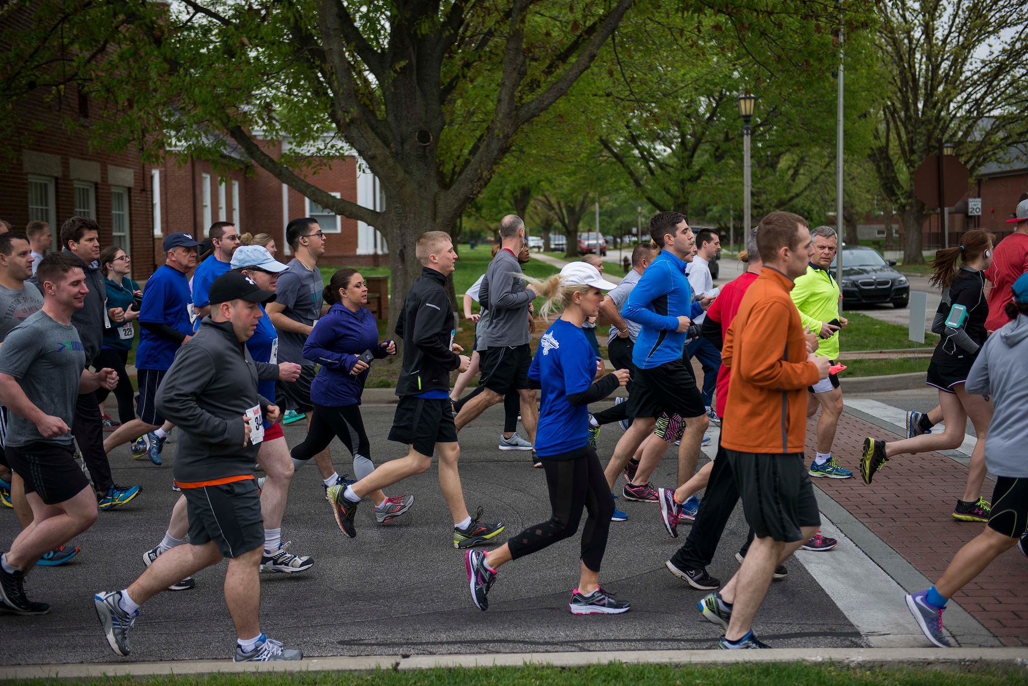 Members of Team Scott participate in the Race Through Scott's Past, at Scott Air Force Base, Illinois, April 21, 2017. The course took runners past historic buildings on base. (U.S. Air Force photo by Staff Sgt. Clayton Lenhardt)