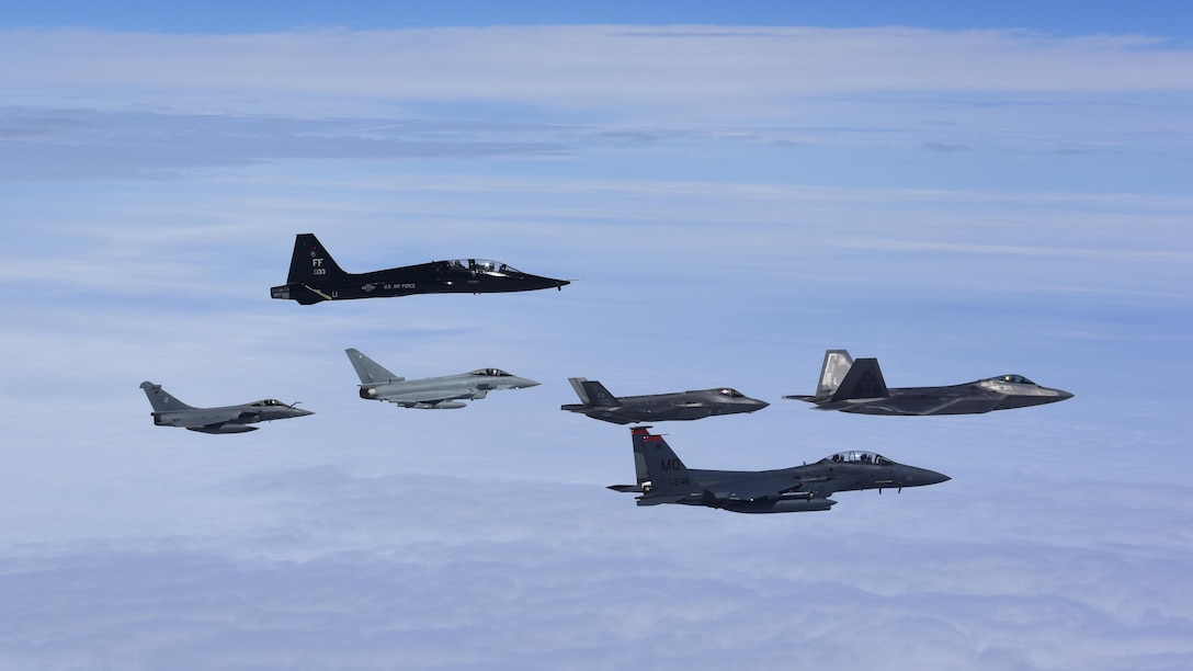 U.S. Air Force, French air force and Royal air force fly in formation during ATLANTIC TRIDENT 17 near Joint Base Langley-Eustis, Va., April 26, 2017. The exercise simulated a highly-contested, degraded and operationally-limited environment where U.S. pilots, allied pilots and ground crews tested their readiness, enhanced interoperability through combined operations, to develop new tactics, techniques and procedures. (U.S. Air Force photo/Staff Sgt. Natasha Stannard)