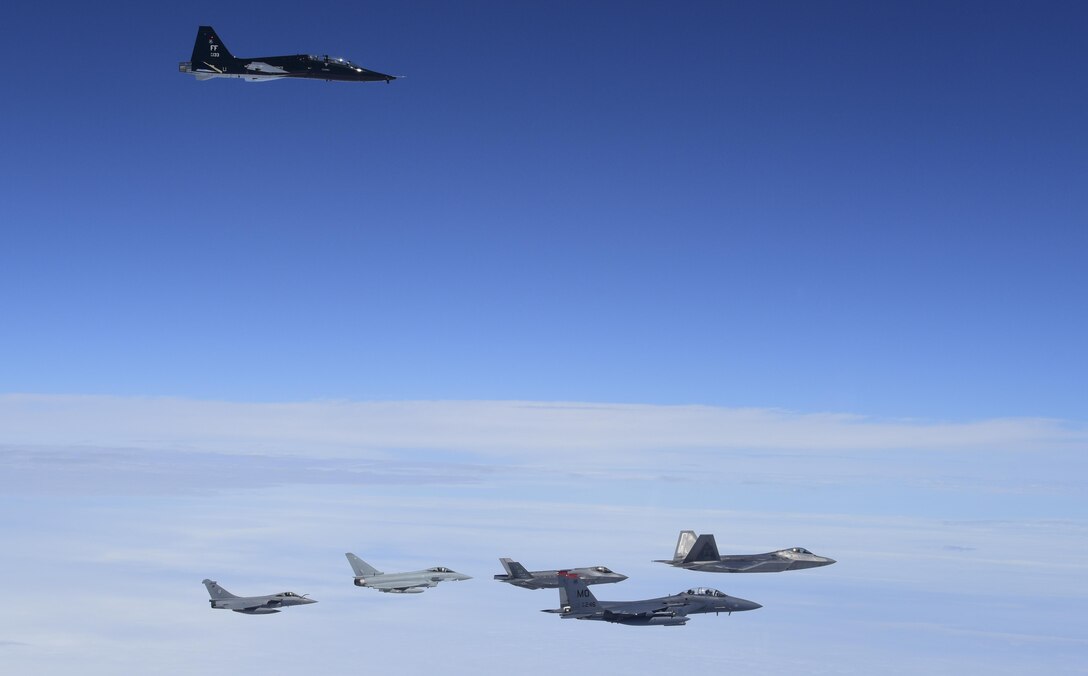 A 71st Fighter Training Squadron T-38 Talon flies above U.S. Air Force, French air force and Royal air force planes during ATLANTIC TRIDENT 17 near Joint Base Langley-Eustis, Va., April 26, 2017. The U.S. Air Force F-15E Strike Eagles and T-38 Talons played the roles of adversary aircraft during the exercise, testing the coalition team's capabilities. (U.S. Air Force photo/Staff Sgt. Natasha Stannard)