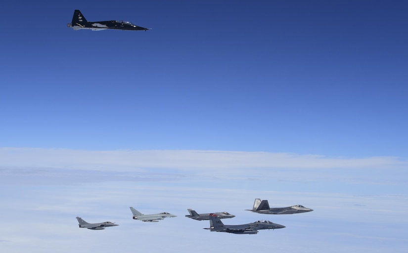 A 71st Fighter Training Squadron T-38 Talon flies above U.S. Air Force, French air force and Royal air force planes during ATLANTIC TRIDENT 17 near Joint Base Langley-Eustis, Va., April 26, 2017. The U.S. Air Force F-15E Strike Eagles and T-38 Talons played the roles of adversary aircraft during the exercise, testing the coalition team's capabilities. (U.S. Air Force photo/Staff Sgt. Natasha Stannard)