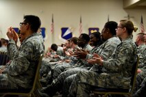 Airmen from the 8th Air Force attend a commander’s call at Barksdale Air Force Base, La., April 21, 2017. During the commander’s call, the 8th Air Force commander, Maj. Gen. Thomas Bussiere, spoke about Airmanship, heritage and the future of the 8th Air Force. (U.S. Air Force photo/Airman 1st Class Sydney Bennett)