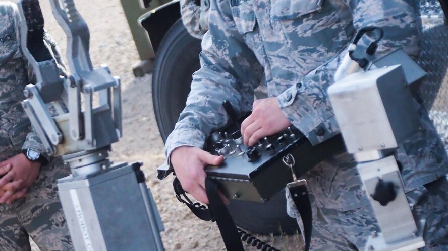 Airmen from the 2nd Civil Engineer Squadron Explosive Ordnance Disposal Flight to demonstrate the F6A robot capabilities at Barksdale Air Force Base, La., April 21, 2017. EOD Airmen specialize in the disposal of explosive material, the F6A robot ensures fewer Airman are harmed during the execution of their mission. (U.S. Air Force photo/Airman 1st Class Sydney Bennett)