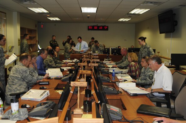 The Emergency Operations Center serves to aid the base in emergency operations by offering base commanders and squadrons the ability to think, plan and communicate actions necessary from a safe location. The EOC focuses on base capabilities and recovery with the resources immediately available. (U.S. Air Force Photo by Airman 1st Class Myles Stepp/Released).