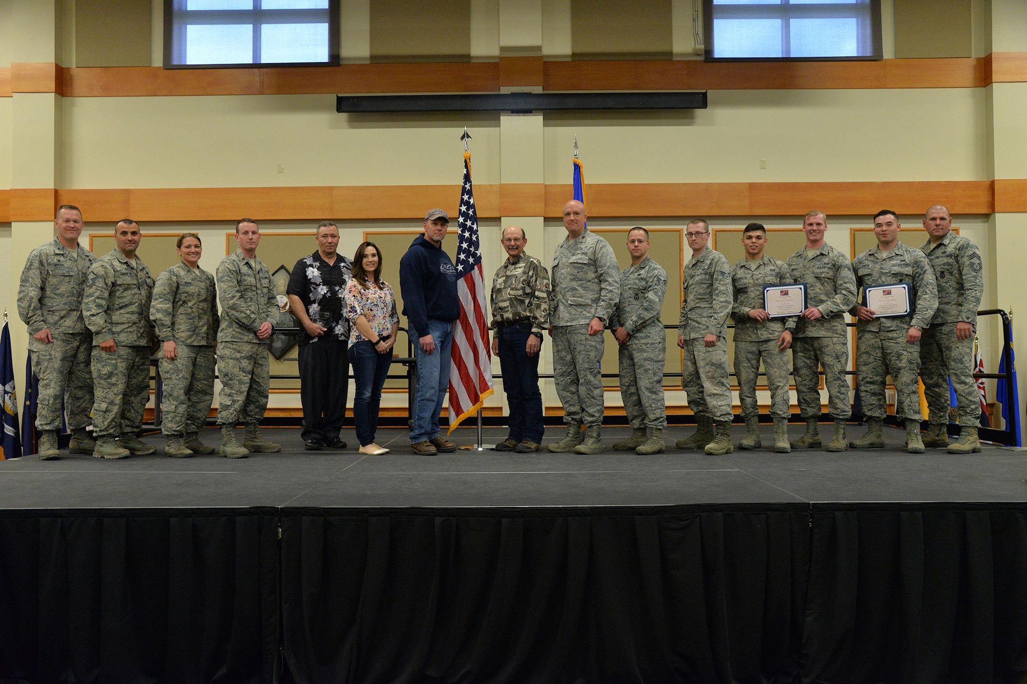 Winners of the first quarter Wing Quarterly Awards pose for a photo at the Grizzly Bend April 26, 2017. Pictured from left to right are: Col. Kenneth Speidel, 341st Maintenance Group commander; Senior NCO of the Quarter, Master Sgt. Jess LeMaster, 341st Security Forces Group; Company Grade Officer of the Quarter, 1st Lt. Teresa Doskey, 341st Mission Support Group; Field Grade Officer of the Quarter, Maj. Timothy Weigle, 341st Medical Group; Civilian Category I non-supervisory, Brian Perry, 341st MDG; Civilian Category II non-supervisory, Jennifer George, 341st MSG; Civilian Category I supervisory, Gary Martin, 341st MSG; Civilian Category II supervisory, Leighton Dresch, 341st MXG; Professional Team of the Quarter, Chaplain (Maj.) Jason Botts, 341st Missile Wing Chapel Support Team; Honor Guard member of the Quarter, Senior Airman Geovanie Medina-Moreno, 341st SFG; Volunteer of the Quarter, Senior Airman Colton Abernathy, 341st MSG; Dorm of the Quarter, Airmen 1st Class Xavier Throckmorton and Kevin Potter, 819th RED HORSE Squadron; Dorm Room of the Quarter, Airman 1st Class Roberto Garcia, 341st Security Forces Squadron. Not pictured: Airman of the Quarter, Senior Airman Jonathan Kitts, 341st SFG; NCO of the Quarter, Tech. Sgt. Stefan Hobbs Jr., 341st SFG; and Spouse of the Quarter, Kelly Croswait, 819th RHS. (U.S. Air Force photo/Airman 1st Class Daniel Brosam)