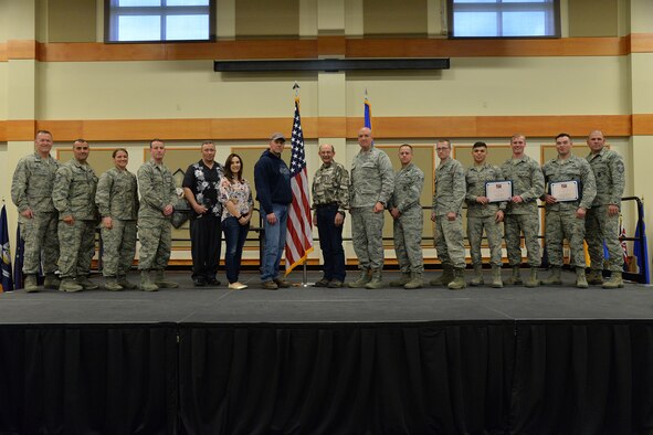 Winners of the first quarter Wing Quarterly Awards pose for a photo at the Grizzly Bend April 26, 2017. Pictured from left to right are: Col. Kenneth Speidel, 341st Maintenance Group commander; Senior NCO of the Quarter, Master Sgt. Jess LeMaster, 341st Security Forces Group; Company Grade Officer of the Quarter, 1st Lt. Teresa Doskey, 341st Mission Support Group; Field Grade Officer of the Quarter, Maj. Timothy Weigle, 341st Medical Group; Civilian Category I non-supervisory, Brian Perry, 341st MDG; Civilian Category II non-supervisory, Jennifer George, 341st MSG; Civilian Category I supervisory, Gary Martin, 341st MSG; Civilian Category II supervisory, Leighton Dresch, 341st MXG; Professional Team of the Quarter, Chaplain (Maj.) Jason Botts, 341st Missile Wing Chapel Support Team; Honor Guard member of the Quarter, Senior Airman Geovanie Medina-Moreno, 341st SFG; Volunteer of the Quarter, Senior Airman Colton Abernathy, 341st MSG; Dorm of the Quarter, Airmen 1st Class Xavier Throckmorton and Kevin Potter, 819th RED HORSE Squadron; Dorm Room of the Quarter, Airman 1st Class Roberto Garcia, 341st Security Forces Squadron. Not pictured: Airman of the Quarter, Senior Airman Jonathan Kitts, 341st SFG; NCO of the Quarter, Tech. Sgt. Stefan Hobbs Jr., 341st SFG; and Spouse of the Quarter, Kelly Croswait, 819th RHS. (U.S. Air Force photo/Airman 1st Class Daniel Brosam)