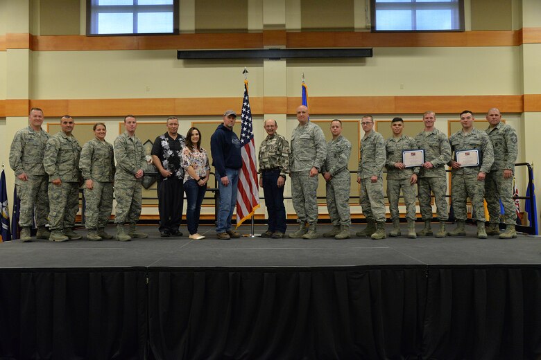 Winners of the first quarter Wing Quarterly Awards pose for a photo at the Grizzly Bend April 26, 2017. Pictured from left to right are: Col. Kenneth Speidel, 341st Maintenance Group commander; Senior NCO of the Quarter, Master Sgt. Jess LeMaster, 341st Security Forces Group; Company Grade Officer of the Quarter, 1st Lt. Teresa Doskey, 341st Mission Support Group; Field Grade Officer of the Quarter, Maj. Timothy Weigle, 341st Medical Group; Civilian Category I non-supervisory, Brian Perry, 341st MDG; Civilian Category II non-supervisory, Jennifer George, 341st MSG; Civilian Category I supervisory, Gary Martin, 341st MSG; Civilian Category II supervisory, Leighton Dresch, 341st MXG; Professional Team of the Quarter, Chaplain (Maj.) Jason Botts, 341st Missile Wing Chapel Support Team; Honor Guard member of the Quarter, Senior Airman Geovanie Medina-Moreno, 341st SFG; Volunteer of the Quarter, Senior Airman Colton Abernathy, 341st MSG; Dorm of the Quarter, Airmen 1st Class Xavier Throckmorton and Kevin Potter, 819th RED HORSE Squadron; Dorm Room of the Quarter, Airman 1st Class Roberto Garcia, 341st Security Forces Squadron. Not pictured: Airman of the Quarter, Senior Airman Jonathan Kitts, 341st SFG; NCO of the Quarter, Tech. Sgt. Stefan Hobbs Jr., 341st SFG; and Spouse of the Quarter, Kelly Croswait, 819th RHS. (U.S. Air Force photo/Airman 1st Class Daniel Brosam)