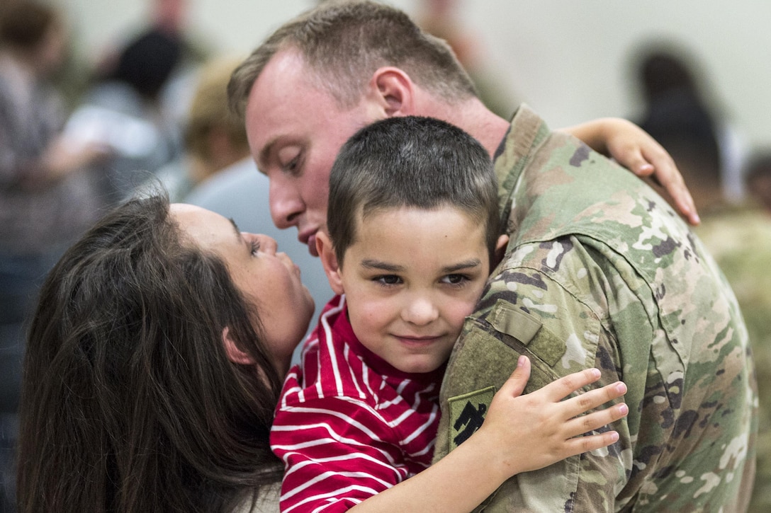 About 70 soldiers return home from a Middle East deployment to a ceremony at the Armed Forces Reserve Center in Norman, Okla., April 25. , 2017. The soldiers are assigned to Oklahoma National Guard's Company A, 777th Aviation Support Battalion, 90th Troop Command. The unit provided aviation support, including aviation refueling operations, ammunition distribution, warehouse operations, water purification and transportation for the 77th Theatre Aviation Brigade. Army National Guard photo by Sgt. 1st Class Amber Osei