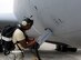 U.S. Air Force Staff Sgt. Jason Cokley, 909th Aircraft Maintenance Unit crew chief, plugs in a power source to a KC-135 Stratotanker assigned to the 909th Air Refueling Squadron April 20, 2017, at Kadena Air Base, Japan. Crew chiefs play a vital role in ensuring aircraft are ready for flight and pre-flight inspections by pilots. (U.S. Air Force photo by Senior Airman Lynette M. Rolen)