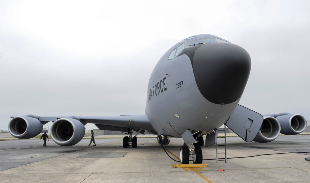 U.S. Air Force Airmen from the 909th Air Refueling Squadron perform pre-flight checks on a KC-135 Stratotanker April 20, 2017, at Kadena Air Base, Japan.  The 909th ARS maintains global reach by providing capable aircraft for contingency and strategic operations. (U.S. Air Force photo by Senior Airman Lynette M. Rolen)