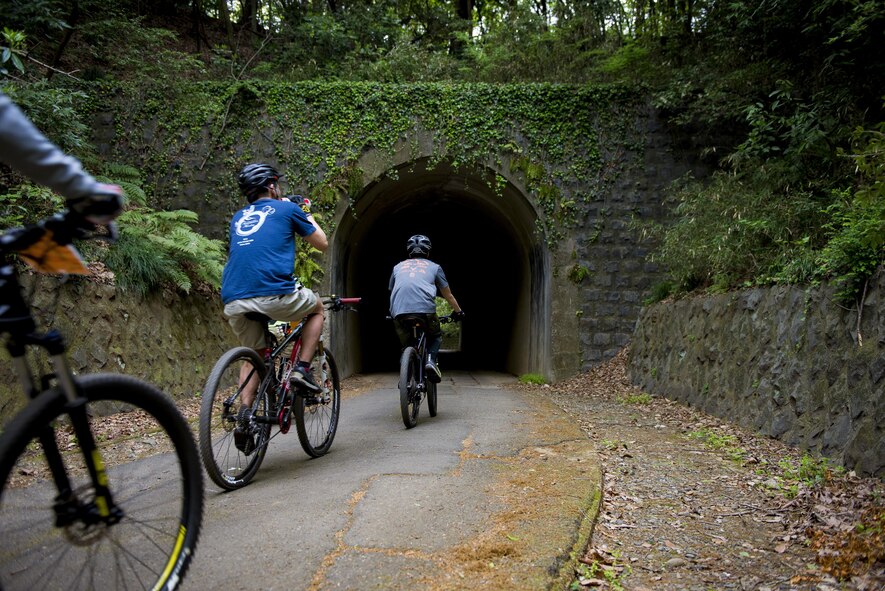 Participants in the Tour de Tama mountain bike race ride through a tunnel April 22, 2017, at Tama Hills Recreation Area, Japan. The course was approximately three miles in length and an approximate 3000 feet in combined elevation gain. (U.S. Air Force photo by Airman 1st Class Donald Hudson)