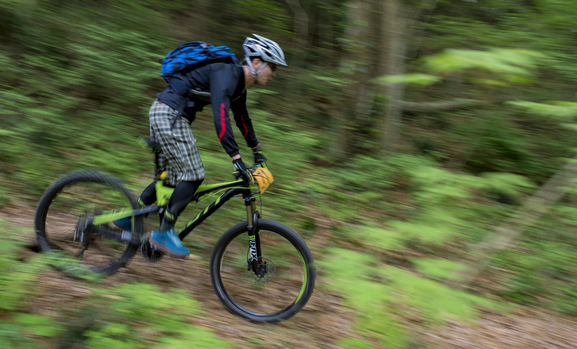 A participant in the Tour de Tama mountain bike race rides quickly downhill through forest April 22, 2017, at Tama Hills Recreation Area, Japan. The race was open to anyone, civilians were able to register at local bike shops throughout the Tokyo Metropolitan area and military were able to register at their local base Outdoor Recreation Center. (U.S. Air Force photo by Airman 1st Class Donald Hudson)