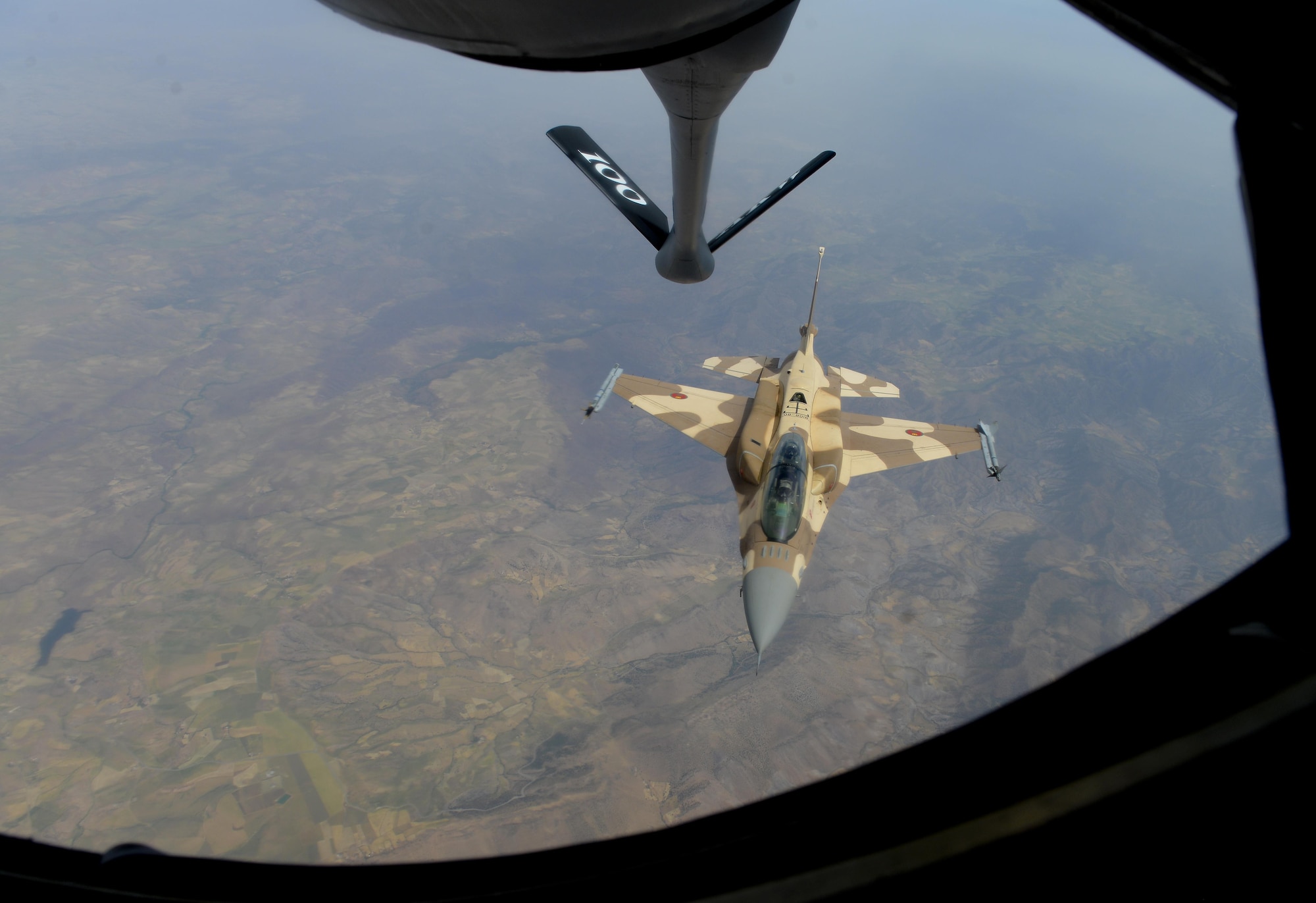 A Moroccan F-16 Fighting Falcon prepares to receive fuel from a U.S. Air Force KC-135 Stratotanker assigned to the 100th Air Refueling Wing from RAF Mildenhall, England, during exercise African Lion on April 19, 2017, over Morocco. Air to air refueling provides receiving aircraft the ability to fly longer and farther enabling receivers to accomplish long range objectives and missions. (U.S. Air Force photo by Staff Sgt. Micaiah Anthony)  