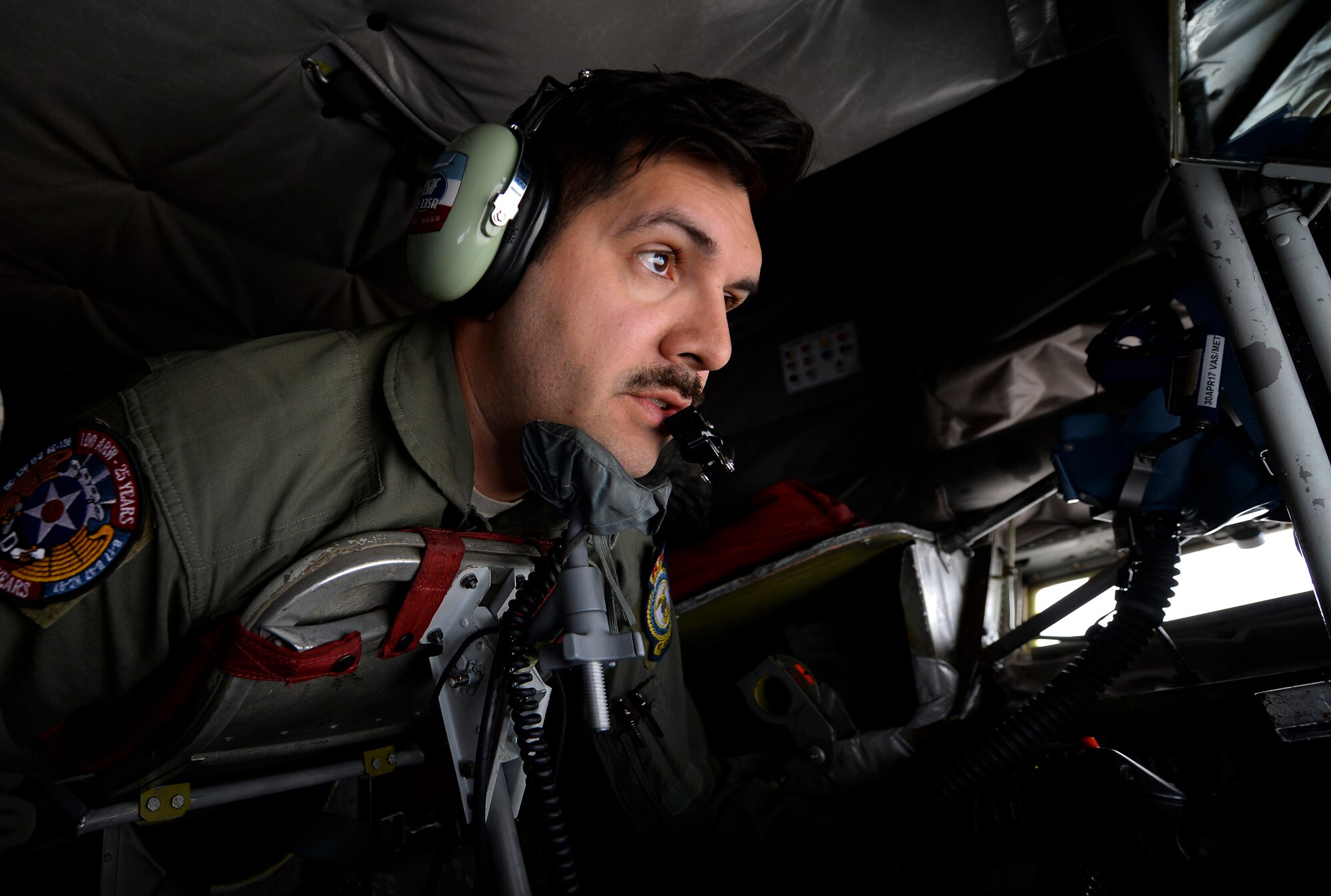 U.S. Air Force Tech. Sgt. Augie Marshall, 351st Air Refueling Squadron instructor boom operator, gives fuel to a Moroccan F-16 Fighting Falcons during exercise African Lion on April 19, 2017, over Morocco. Marshall flew the boom and maintained constant communication with the receiving aircraft during in-flight refueling. (U.S. Air Force photo by Staff Sgt. Micaiah Anthony)