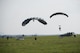 U.S. Air Force Airmen and U.S. Army Soldiers conduct parachute training April 24, 2017, above Kadena Air Base, Japan. Parachute training better enables joint and bilateral long-range rescue and rapid response to humanitarian or security crises. (U.S. Air Force photo by Senior Airman Omari Bernard)