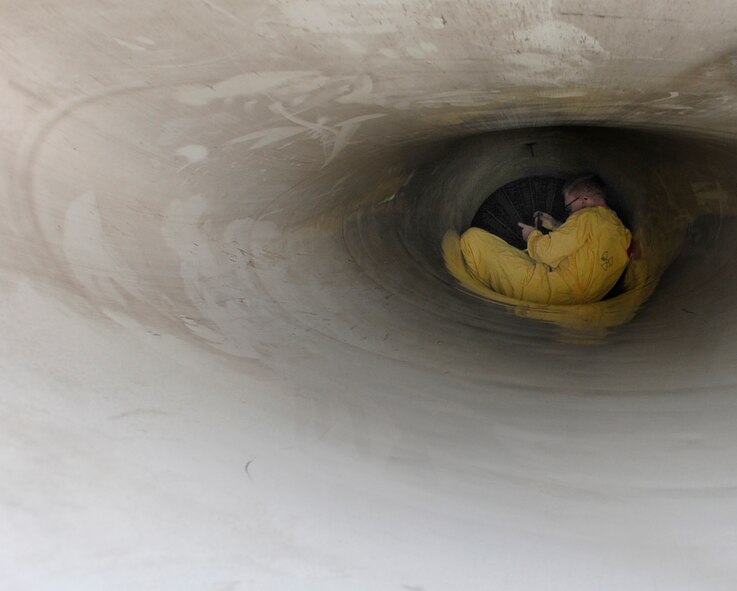 U.S. Air Force Staff Sgt. Bradley Henson, 36th Aircraft Maintenance Unit crew chief, inspects the intake of an F-16 Fighting Falcon during Exercise MAX THUNDER 17 at Kunsan Air Base, Republic of Korea, April 26, 2017. Max Thunder is a regularly scheduled training exercise designed to enhance the readiness of U.S. and ROK forces to defend the Republic of Korea. (U.S. Air Force photo by Staff Sgt. Chelsea Sweatt/Released)
