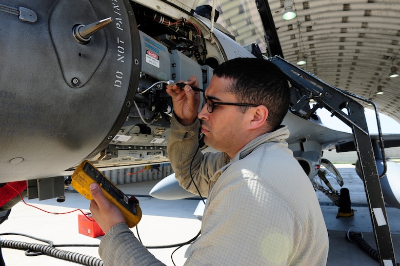 U.S. Air Force Staff Sgt. Jair Hausheer, 36th Aircraft Maintenance Unit F-16 avionics technician, works on an F-16 Fighting Falcon’s radar system during Exercise MAX THUNDER 17 at Kunsan Air Base, Republic of Korea, April 26, 2017. Max Thunder is a regularly scheduled training exercise designed to enhance the readiness of U.S. and ROK forces to defend the Republic of Korea (U.S. Air Force photo by Staff Sgt. Chelsea Sweatt/Released)