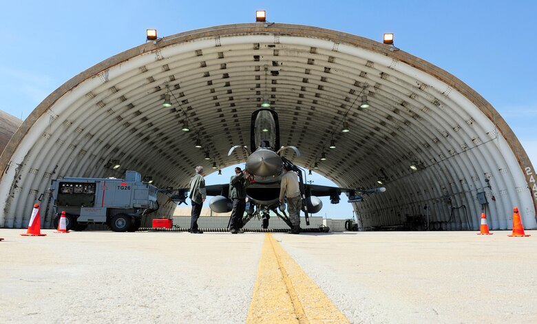 Airmen from the 36th Aircraft Maintenance Unit perform maintenance on an F-16 Fighting Falcon during Exercise MAX THUNDER 17 at Kunsan Air Base, Republic of Korea, April 26, 2017. Max Thunder is part of a continuous exercise program to enhance interoperability between U.S. and ROK forces. These exercises highlight the long-standing military partnership, commitment and enduring friendship between two nations, which help to ensure security on the Korean Peninsula, and reaffirm the U.S. commitment to stability in the Northeast Asia region. (U.S. Air Force photo by Staff Sgt. Chelsea Sweatt/Released)