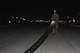 Senior Airman Kyle Mahoney, 455th Expeditionary Civil Engineer Squadron, stretches a segment of tape for inspection April 20, 2017, at Bagram Airfield, Afghanistan. When capturing a landing aircraft, the tape is stretched and used to rapidly slow down the aircraft. An inspection is conducted to ensure the tape is the correct length. (U.S. Air Force photo by Staff Sgt. Benjamin Gonsier)