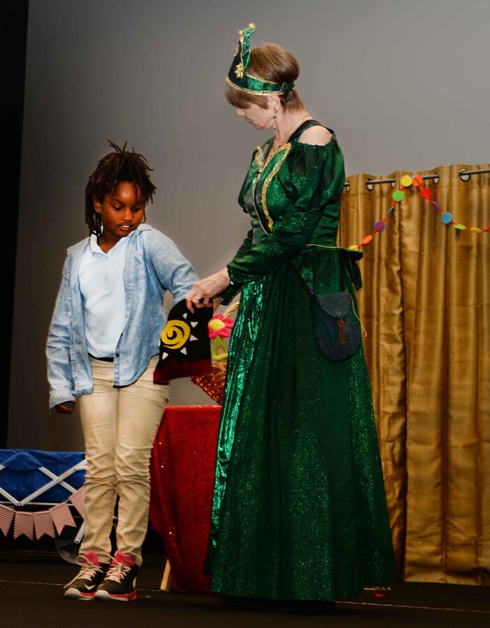 Queen Emeralda, professional storyteller, leaves her home in Fairyland to bring “laughter and fun” to Marine Corps Logistics Base Albany’s young audience, who filled the Base Theater, April 25. The event, which was hosted in celebration of the Month of the Military Child, was also held to bring awareness to and in observance of the 2017 Child Abuse and Neglect Prevention Month. Three-year old students from MCLB Albany’s Child Development Center as well as kindergarteners from International Studies Elementary Charter School, Albany, Ga., attended the activities.