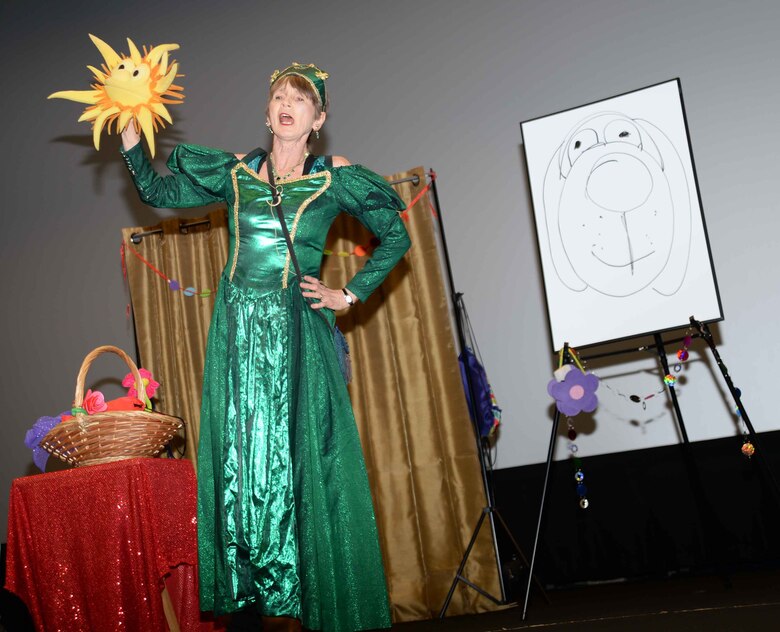 Queen Emeralda, professional storyteller, leaves her home in Fairyland to bring “laughter and fun” to Marine Corps Logistics Base Albany’s young audience, who filled the Base Theater, April 25. The event, which was hosted in celebration of the Month of the Military Child, was also held to bring awareness to and in observance of the 2017 Child Abuse and Neglect Prevention Month. Three-year old students from MCLB Albany’s Child Development Center as well as kindergarteners from International Studies Elementary Charter School, Albany, Ga., attended the activities.