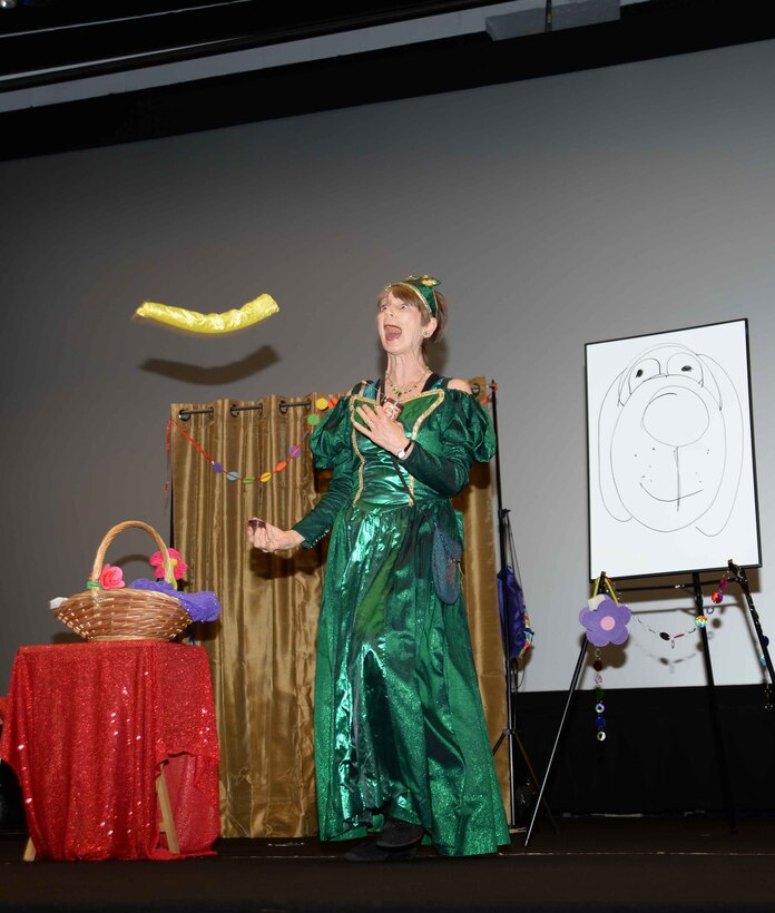 Queen Emeralda, professional storyteller, leaves her home in Fairyland to bring “laughter and fun” to Marine Corps Logistics Base Albany’s young audience, who filled the Base Theater, April 25. The event, which was hosted in celebration of the Month of the Military Child, was also held to bring awareness to and in observance of the 2017 Child Abuse and Neglect Prevention Month. Three-year old students from MCLB Albany’s Child Development Center as well as kindergarteners from International Studies Elementary Charter School, Albany, Ga., attended the activities.