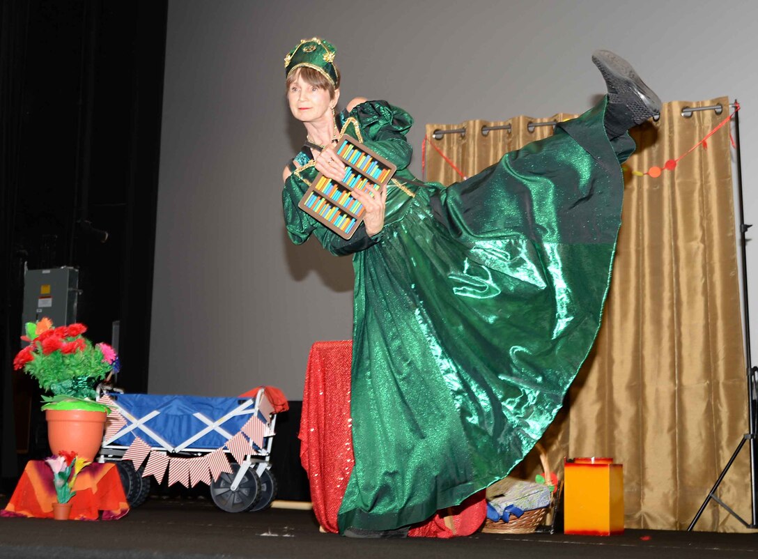 Queen Emeralda, professional storyteller, leaves her home in Fairyland to bring “laughter and fun” to Marine Corps Logistics Base Albany’s young audience, who filled the Base Theater, April 25. The event, which was hosted in celebration of the Month of the Military Child, was also held to bring awareness to and in observance of the 2017 Child Abuse and Neglect Prevention Month. Three-year old students from MCLB Albany’s Child Development Center as well as kindergarteners from International Studies Elementary Charter School, Albany, Ga., attended the activities.