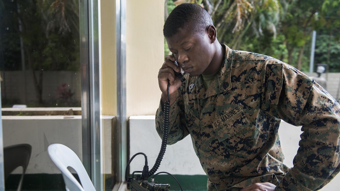 U.S. Marine Staff Sgt. Alexander Davis makes a test call on a AN/PRC-117G radio during Balikatan 2017 at Camp Lapulapu, Cebu, April 25, 2017. Balikatan is an annual U.S.-Philippine military bilateral exercise focused on a variety of missions, including humanitarian assistance and disaster relief, and counterterrorism. (U.S. Air Force photo by Senior Airman Corey Pettis)