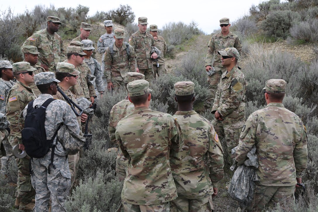 Air Force Tech. Sgt. Isaac Houston discusses different types of shelters during a survival, evasion, resistance and escape, or SERE, class at the Yakima Training Center, Yakima, Wash., April 25, 2017. Army photo by Sgt. Kalie Jones